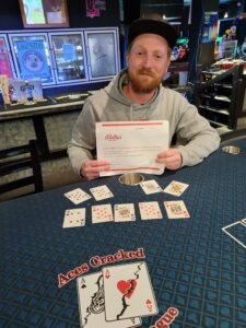 Ryan Toal won his Bally's $100 voucher when his KKK88 was beat by 8888